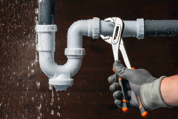 Professional Emergency Plumber technician working in Spring House, PA